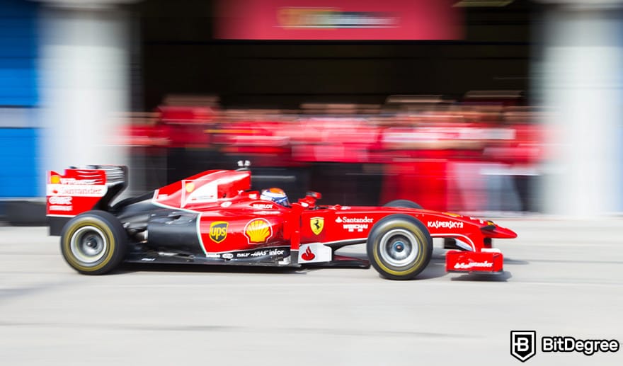 Bitcoin Como Garantia de Empréstimo: um carro de corrida vermelho da Fórmula 1 acelerando em uma pista.