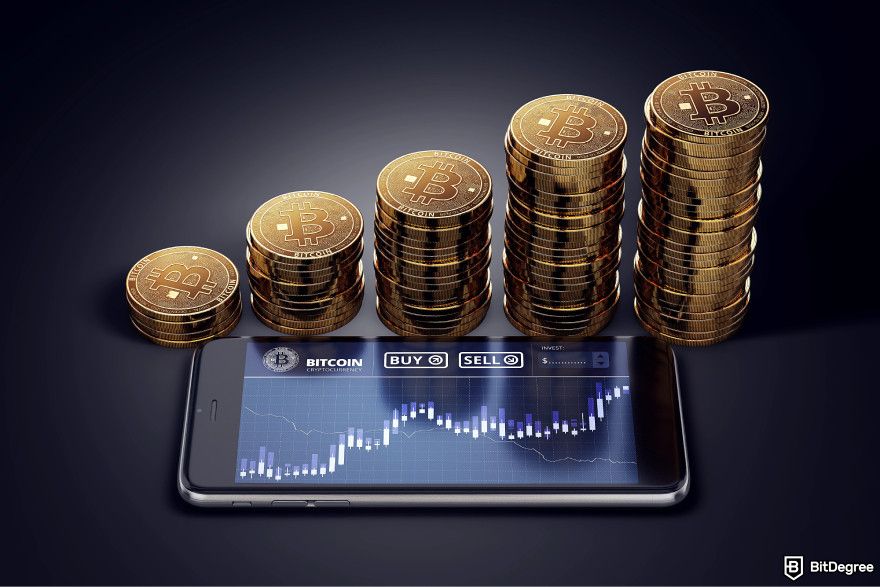 Monedas meme que explotarán: una pila creciente de Bitcoins junto a un smartphone.